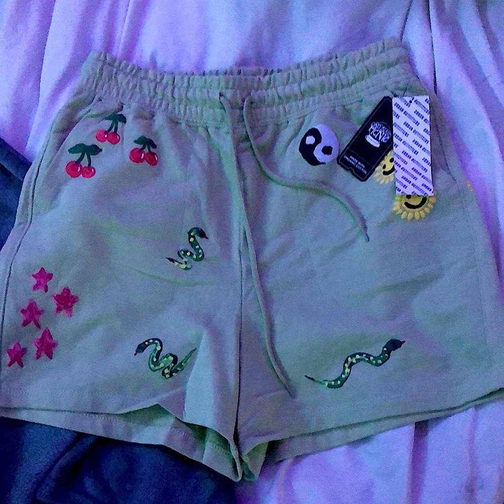 Muted green embroidered shorts